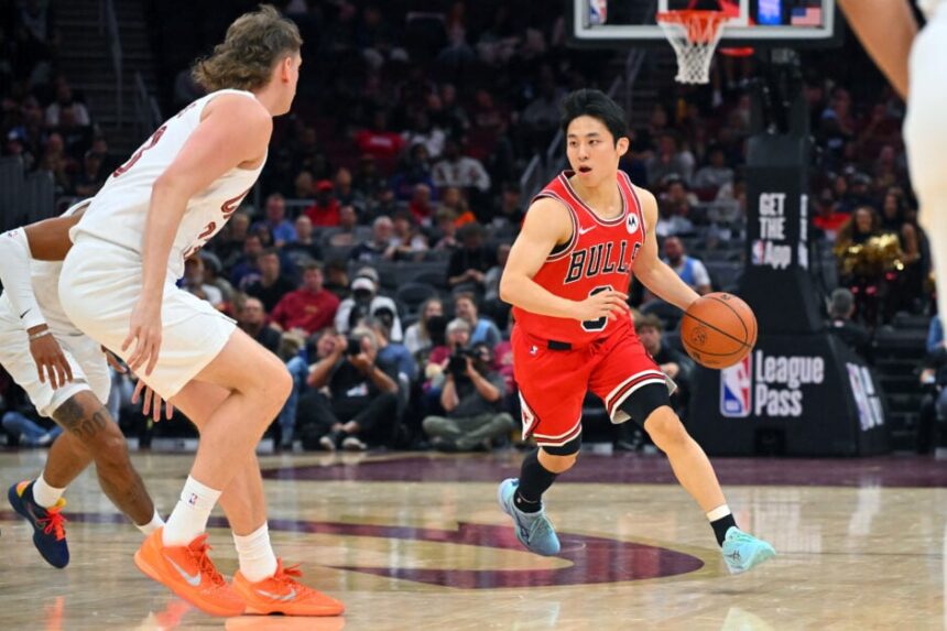 Yuki Kawamura #8 of the Chicago Bulls brings the ball up court during the fourth quarter of a preseason game against the Cleveland Cavaliers at Rocket Arena on October 07, 2025 in Cleveland, Ohio.
