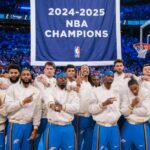Oklahoma City Thunder players pose with their rings in front of the championship banner prior to the game against the Houston Rockets at Paycom Center.