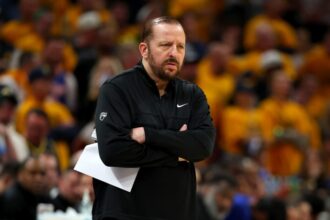 Head coach Tom Thibodeau of the New York Knicks reacts against the Indiana Pacers during the fourth quarter in Game Three of the Eastern Conference Finals of the 2025 NBA Playoffs at Gainbridge Fieldhouse.