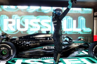 Russell blazes to decisive Singapore GP win