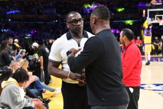 Shannon Sharpe courtside at the Los Angeles Lakers game alongside baseball legend Ken Griffey Jr.