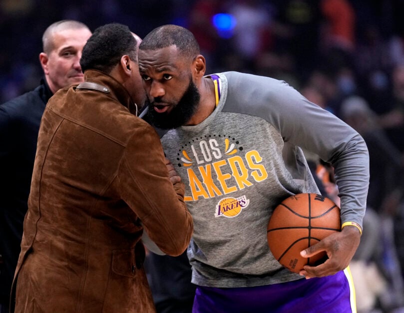 LeBron James #6 of the Los Angeles Lakers greets ESPNs Stephen A. Smith prior to a NBA basketball game against the LA Clippers at the Crypto.com Arena in Los Angeles on Thursday, March 3, 2022.