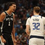 Victor Wembanyama #1 of the San Antonio Spurs reacts to a score during the first half against the Dallas Mavericks at American Airlines Center on October 22, 2025 in Dallas, Texas.
