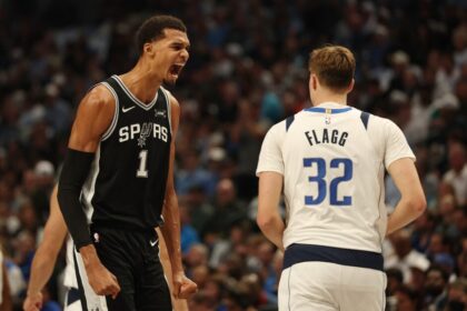 Victor Wembanyama #1 of the San Antonio Spurs reacts to a score during the first half against the Dallas Mavericks at American Airlines Center on October 22, 2025 in Dallas, Texas.