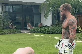 Video: Jake Paul prepares for Tank Davis with backyard beatdown of influencer