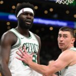 Neemias Queta and Payton Pritchard of Boston Celtics