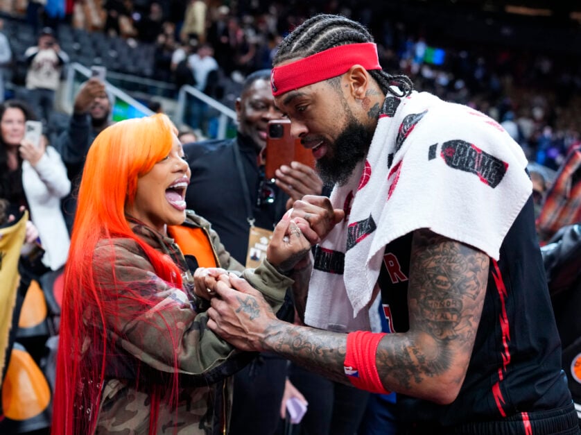 Brandon Ingram #3 of the Toronto Raptors greets rapper GloRilla after hitting the game winning shot against the Indiana Pacers in their basketball game at the Scotiabank Arena.
