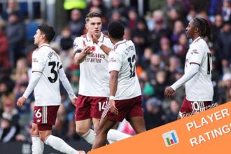 Arsenal players celebrating after scoring vs Burnley