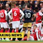 Martin Odegaard nurses an injury during Arsenal vs West Ham