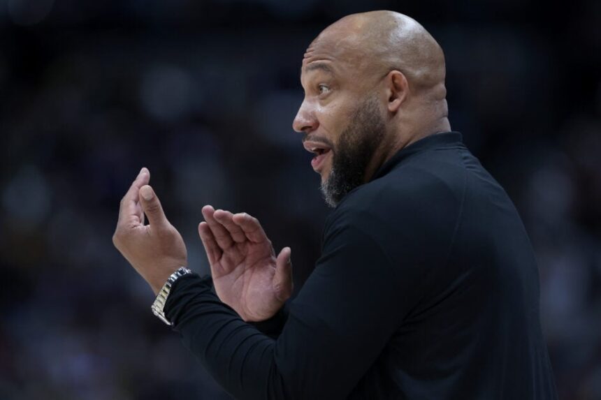 Head coach Darvin Ham of the Los Angeles Lakers directs his team against the Denver Nuggets in the first quarter during game five of the Western Conference First Round Playoffs at Ball Arena.