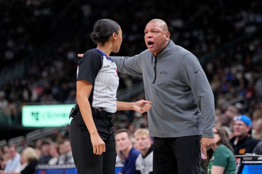 Milwaukee Bucks head coach Doc Rivers complaining to official Simone Jelks during the game against the Houston Rockets.