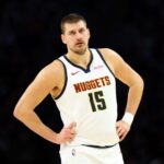 Nikola Jokić #15 of the Denver Nuggets looks on against the Minnesota Timberwolves in the third quarter at Target Center.