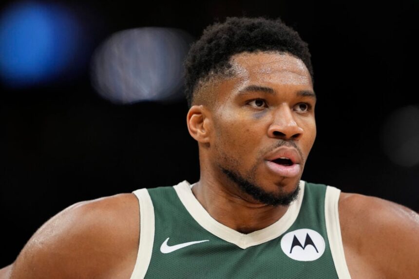 Giannis Antetokounmpo #34 of the Milwaukee Bucks reacts against the Sacramento Kings during the third quarter at Fiserv Forum.