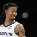 Ja Morant #12 of the Memphis Grizzlies reacts during the third quarter of the NBA game at Mortgage Matchup Center.