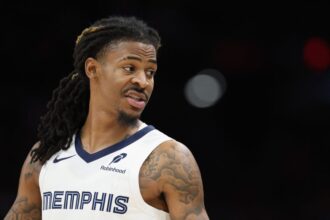 Ja Morant #12 of the Memphis Grizzlies reacts during the third quarter of the NBA game at Mortgage Matchup Center.