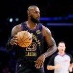 LeBron James #23 of the Los Angeles Lakers dribbles the ball against the Utah Jazz