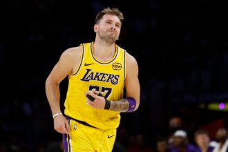 Luka Doncic #77 of the Los Angeles Lakers reacts during play against the Minnesota Timberwolves in the second half at Crypto.com Arena.