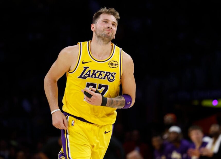 Luka Doncic #77 of the Los Angeles Lakers reacts during play against the Minnesota Timberwolves in the second half at Crypto.com Arena.