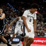 Dylan Harper #2 of the San Antonio Spurs celebrates after scoring against the Brooklyn Nets in first half of a game at Frost Bank Center.