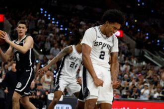 Dylan Harper #2 of the San Antonio Spurs celebrates after scoring against the Brooklyn Nets in first half of a game at Frost Bank Center.
