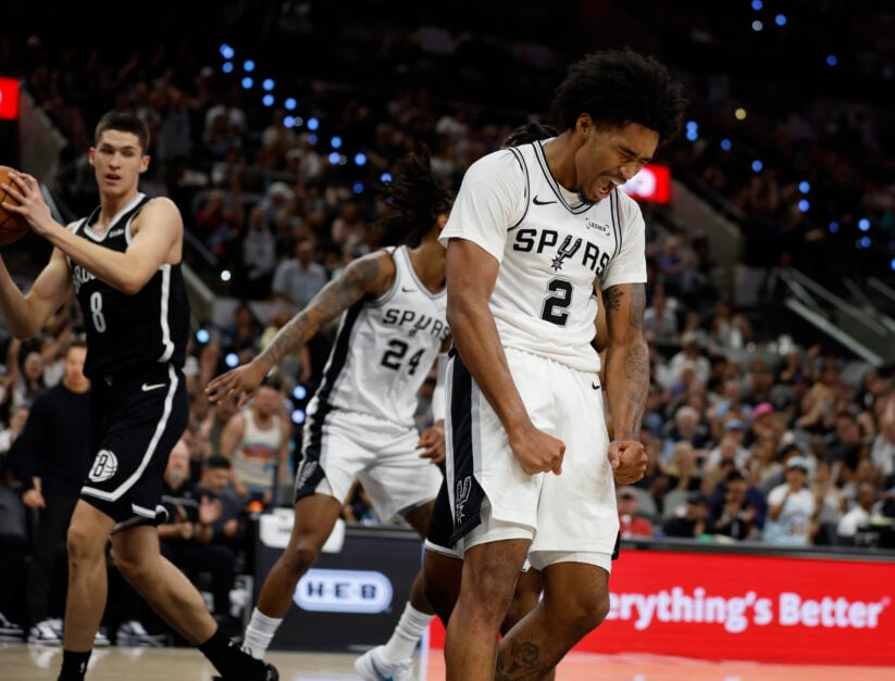 Dylan Harper #2 of the San Antonio Spurs celebrates after scoring against the Brooklyn Nets in first half of a game at Frost Bank Center.