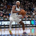 Brandon Williams #10 of the Dallas Mavericks drives to the hoop during the second half against the Washington Wizards at Capital One Arena.