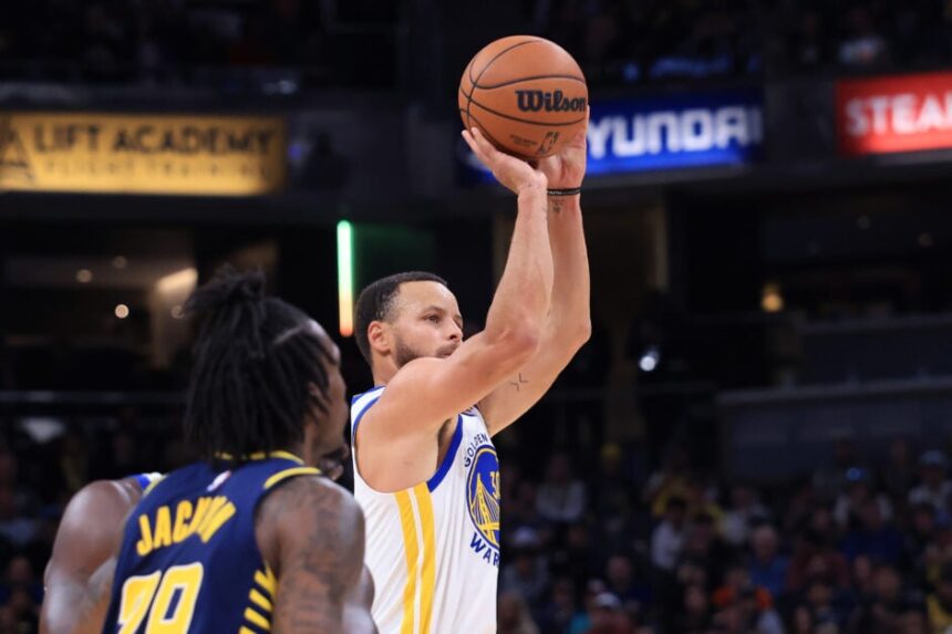 Stephen Curry #30 of the Golden State Warriors takes a shot in the fourth quarter against the Indiana Pacers