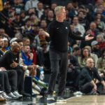 Golden State Warriors head coach Steve Kerr on the sidelines questioning a call.