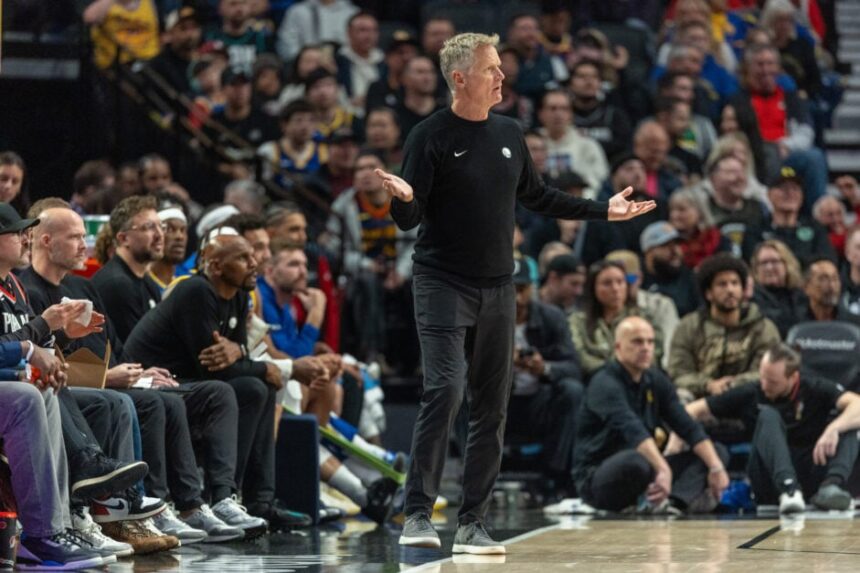 Golden State Warriors head coach Steve Kerr on the sidelines questioning a call.